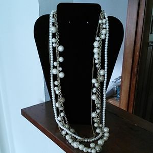 Pearl and gold tone necklace